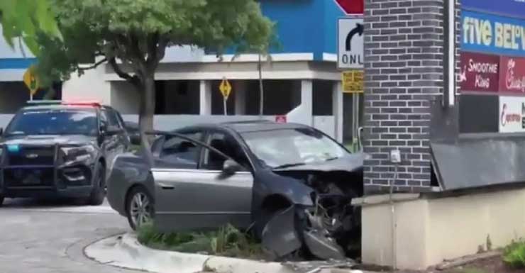 Driver critical after crashing into a North Miami Beach strip mall sign