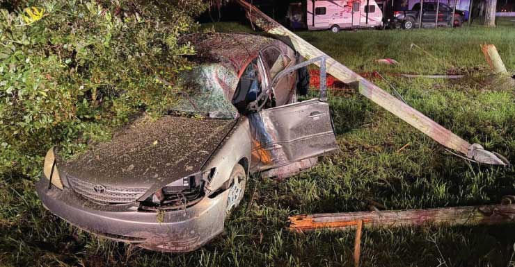 Driver hospitalized after crashing into power pole in Brooksville