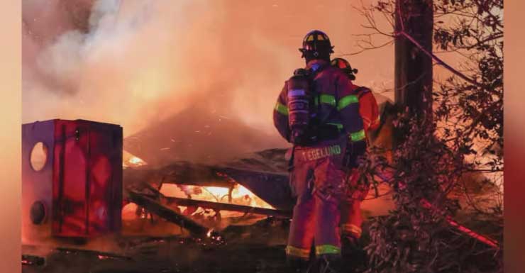 Firefighters encounter live wire while battling Holmes County mobile home fire