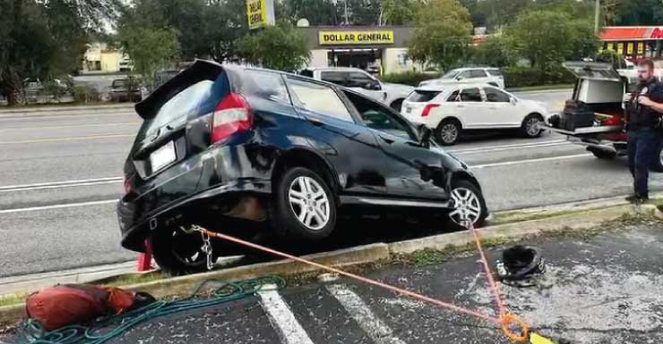 Ocala firefighters respond to crash after vehicle gest stuck on the sidewalk, no injuries reported