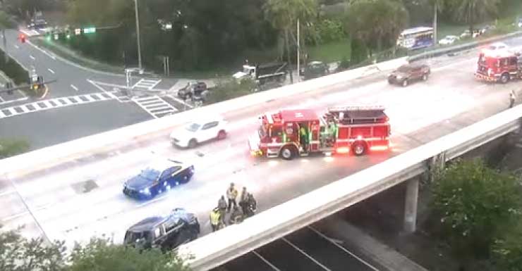 SUV partially hangs off I-275 overpass Thursday morning
