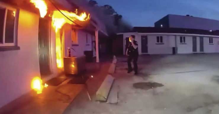 Sarasota police officers get motel occupants out of rooms during fire