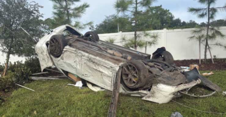 Student driver loses control on rain-slicked I-275