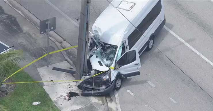 Transport van crashes into pole, causing traffic closure in Hallandale Beach