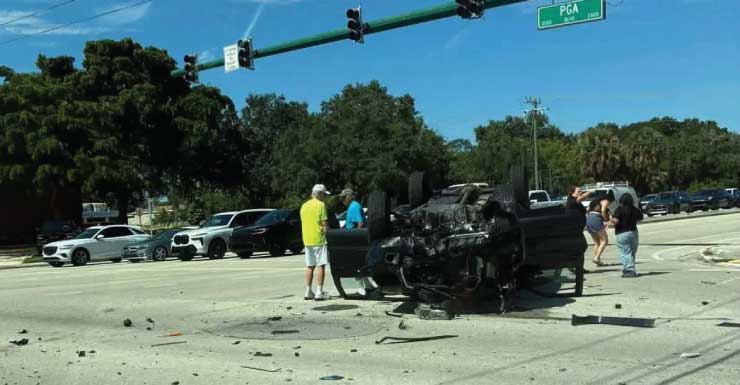 All lanes blocked near PGA Boulevard intersection after rollover crash, 1 hospitalized
