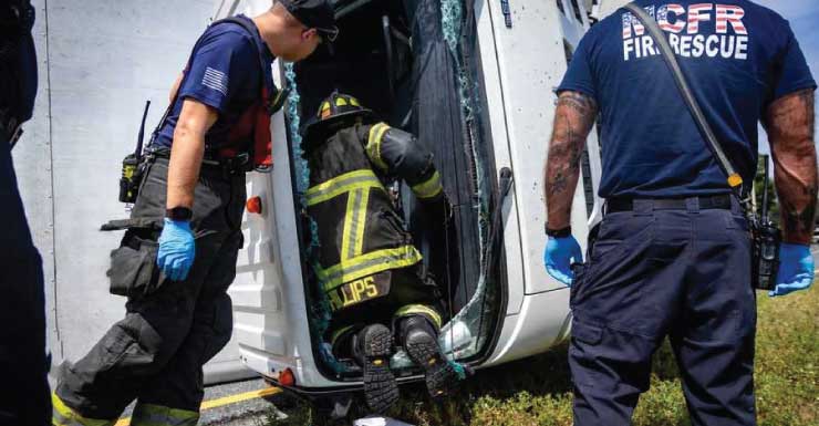 Crews rescue trapped driver after box truck overturns on I-75 in Marion County