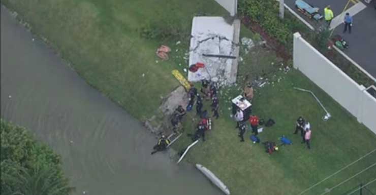 Truck driver hospitalized after plunging into Sunrise lake